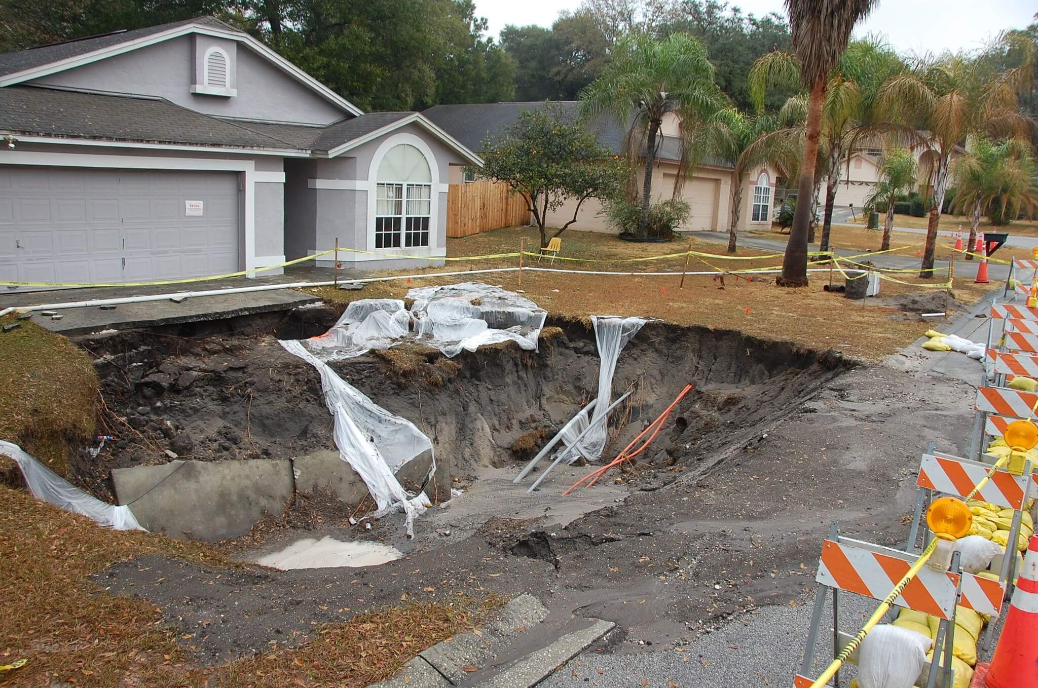 sinkhole in front of Florida house