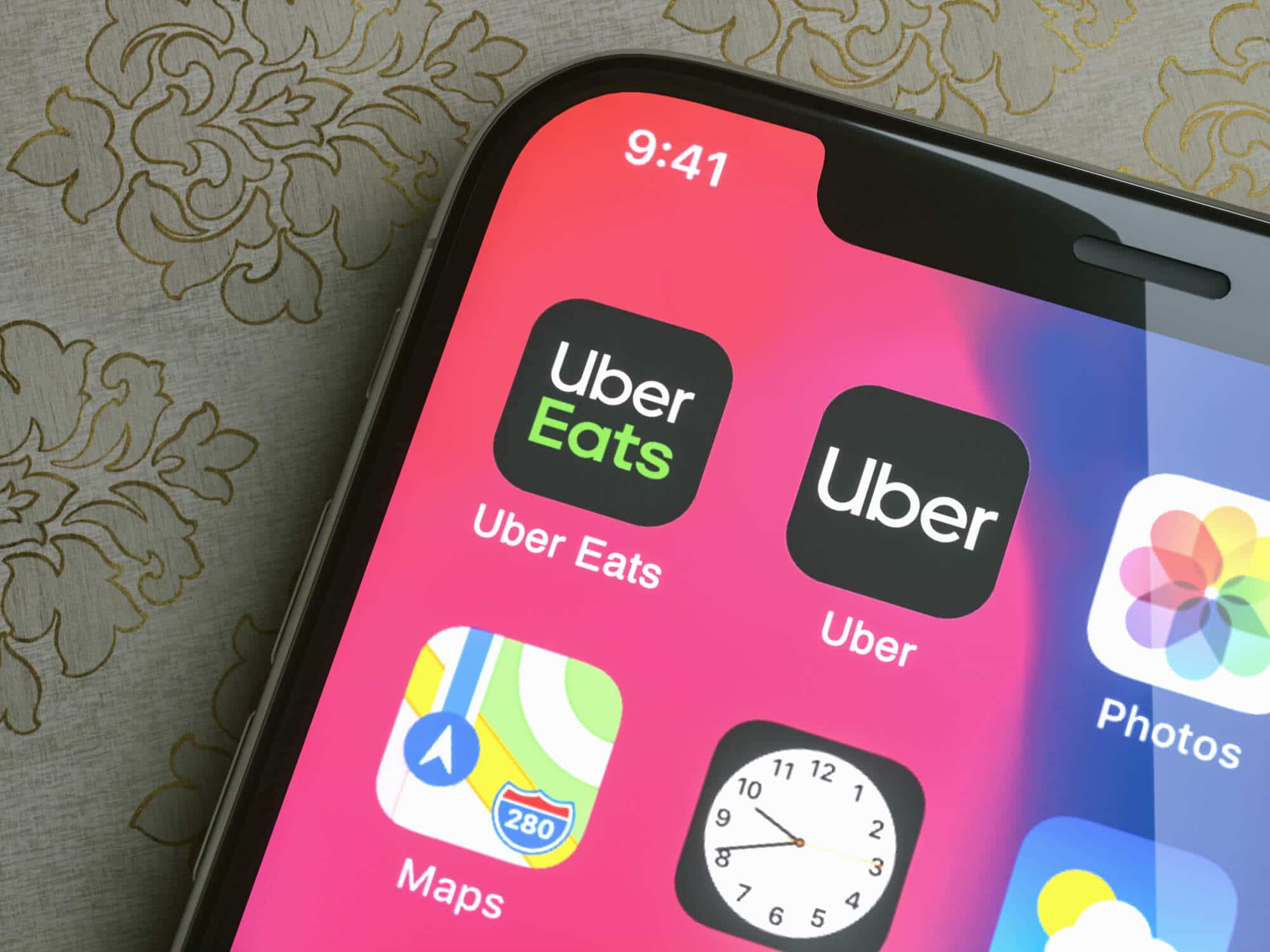 Uber apps on cell phone screen