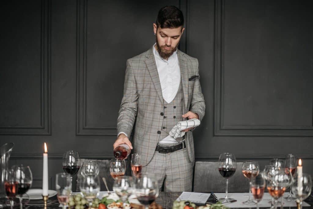 a wine sommelier tries different wines