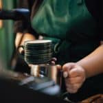 closeup of barista making coffee