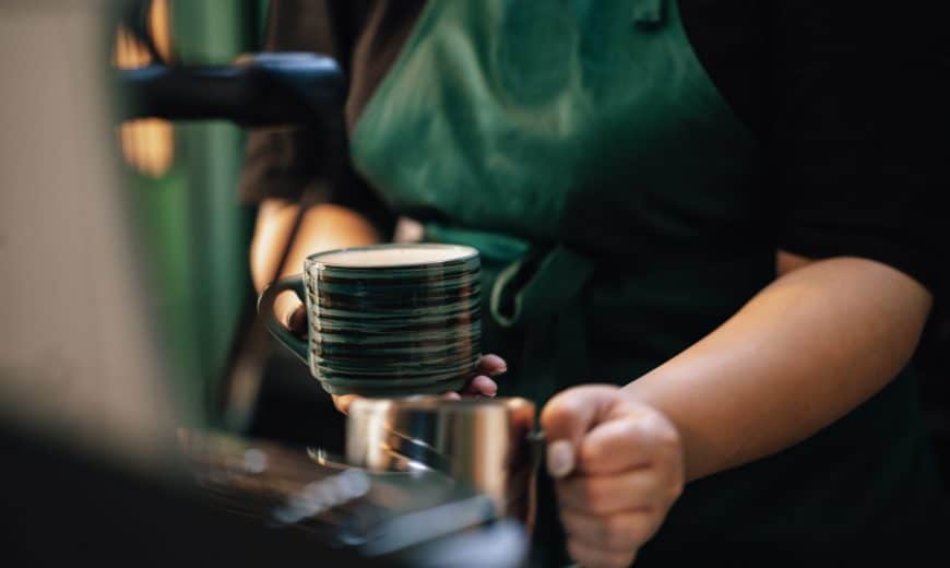 closeup of barista making coffee